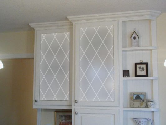 Glass cabinets decorated with Orleans privacy design with Frosted leading lines.
