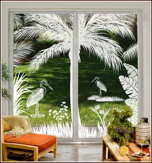 Sliding glass doors that are 8 ft tall decorated with Heron Hideaway decorative window film.